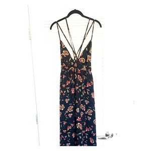 Maxi flower dress with open back and X strips.